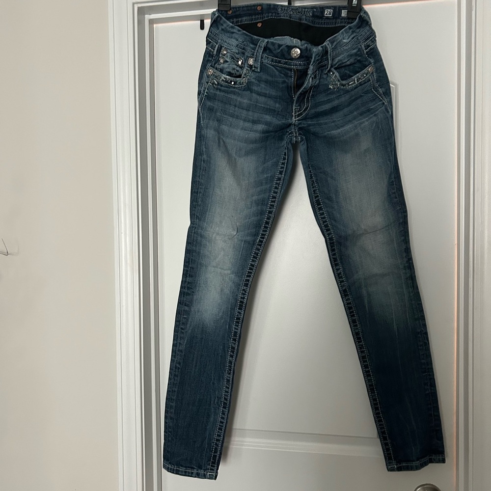 Miss Me Dark Blue Straight Leg Jeans and second pair is boot leg each pair $50.